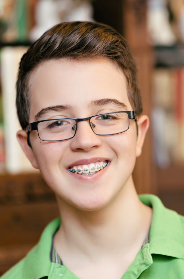 A boy is smiling