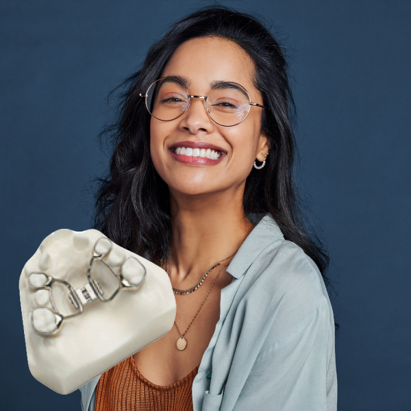 A woman is joyfully smiling